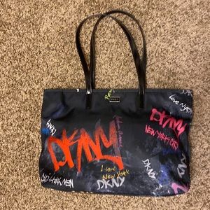 NWOT - DKNY black graffitied style tote bag - new condition!